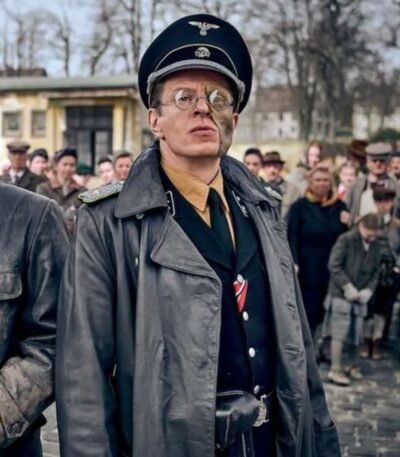 Blood and Gold 2023 Alexander Scheer Black Coat