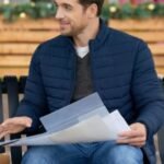 Our Christmas Mural 2023 Dan Jeannotte Blue Puffer Jacket
