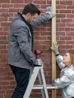 Our Christmas Mural 2023 Dan Jeannotte Grey Jacket