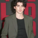 Charlie Evans The World Behind Green Blazer