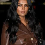 London Fashion Week Simone Ashley Brown Leather Coat