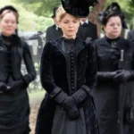Miss Scarlet and the Duke Kate Phillips Black Coat