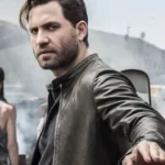 The Last Days of American Crime Graham Bricke Brown Jacket
