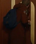 The Portable Door 2023 Patrick Gibson Brown Coat