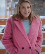 A Cozy Christmas Inn 2022 Jodie Sweetin Pink Coat
