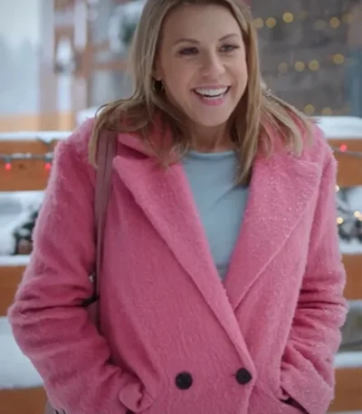 A Cozy Christmas Inn 2022 Jodie Sweetin Pink Coat