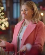 A Cozy Christmas Inn 2022 Jodie Sweetin Pink Coat