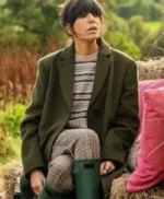 Claudia Winkleman The Traitors UK Green Coat