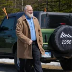 Everything Christmas 2023 George Masswohl Brown Coat