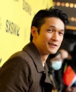 Everything Everywhere All at Once Harry Shum Jr Brown Coat