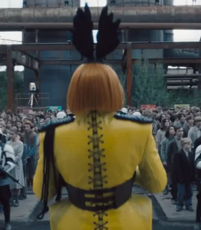 The Hunger Games Sunrise on the Reaping Glenn Close Yellow Coat