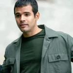 Carlos The Unbearable Weight of Massive Talent Grey Jacket